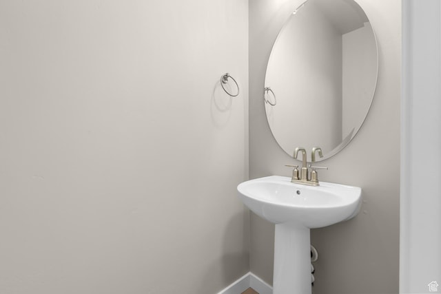 6658 W Spring Snow Ln, Herriman, UT 84096 - bathroom with baseboards
