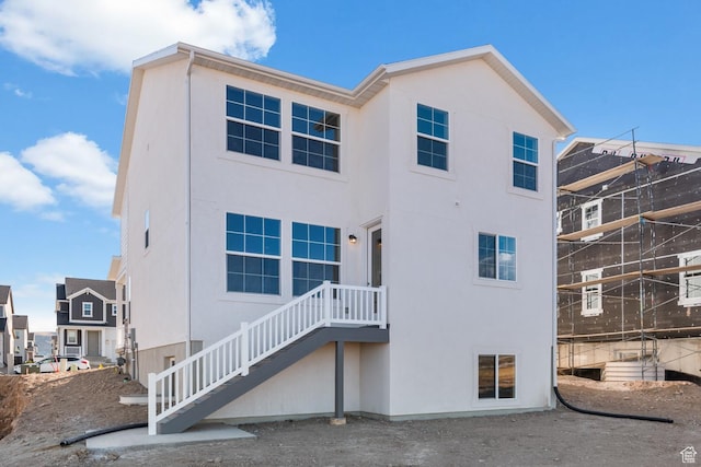 6658 W Spring Snow Ln, Herriman, UT 84096 - back of property with stucco siding