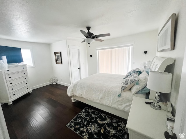 2770 S 9500 E, Jensen, UT 84035 - bedroom with dark wood-type flooring, baseboards, and ceiling fan