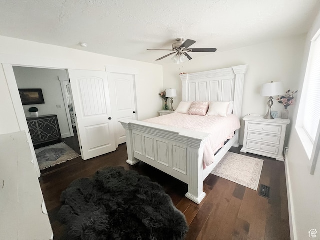 2770 S 9500 E, Jensen, UT 84035 - bedroom featuring dark wood-type flooring, visible vents, a ceiling fan, and a textured ceiling