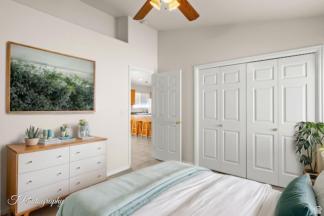 1360 E Telegraph St # 8, Washington, UT 84780 - bedroom with a closet, ceiling fan, vaulted ceiling, and baseboards