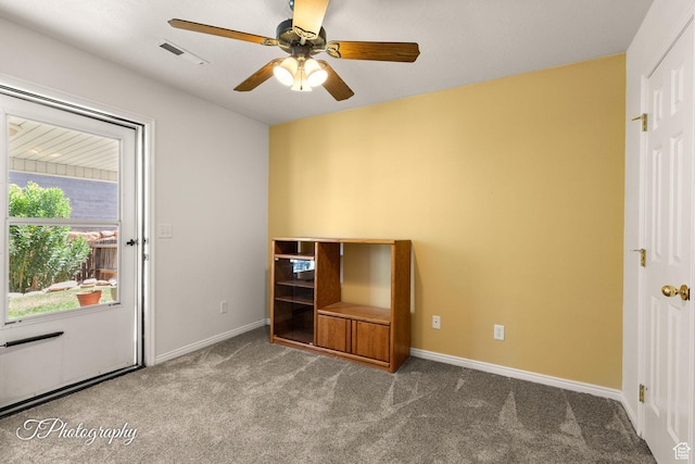 1360 E Telegraph St # 8, Washington, UT 84780 - unfurnished bedroom featuring visible vents, baseboards, a ceiling fan, and carpet