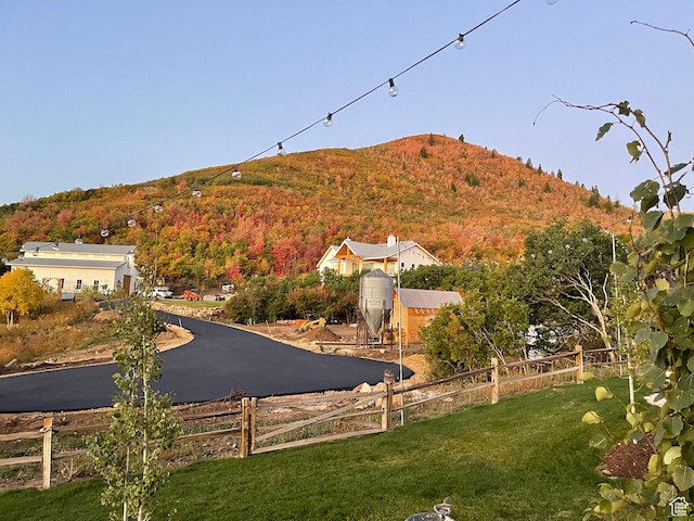 property view of mountains featuring a wooded view