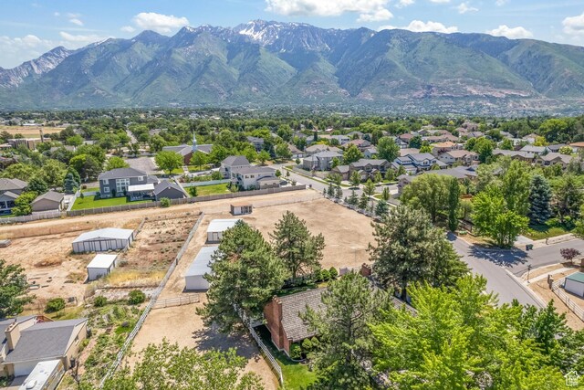 bird's eye view featuring a mountain view and a residential view