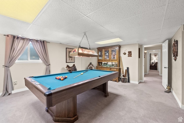 game room with light carpet, a paneled ceiling, baseboards, and billiards