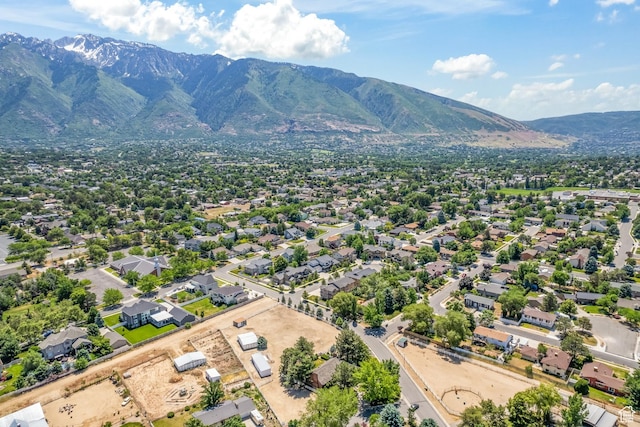 drone / aerial view featuring a mountain view and a residential view