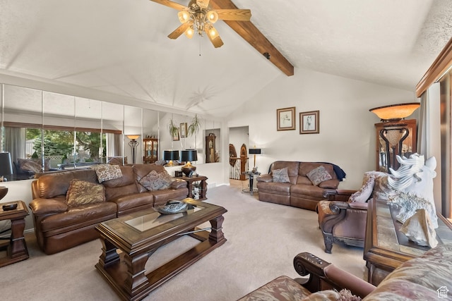 living room featuring vaulted ceiling with beams, carpet flooring, and a ceiling fan