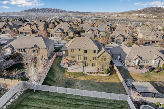 bird's eye view with a residential view and a mountain view