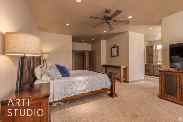1285 Summerwood Cir, Santa Clara, UT 84765 - bedroom with light carpet, recessed lighting, baseboards, and connected bathroom