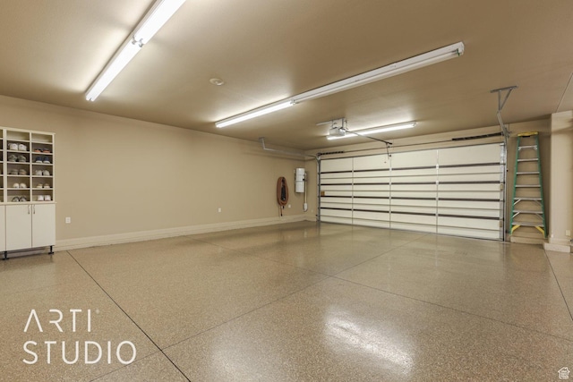 1285 Summerwood Cir, Santa Clara, UT 84765 - garage featuring baseboards