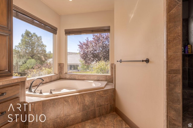 1285 Summerwood Cir, Santa Clara, UT 84765 - bathroom featuring a garden tub and baseboards