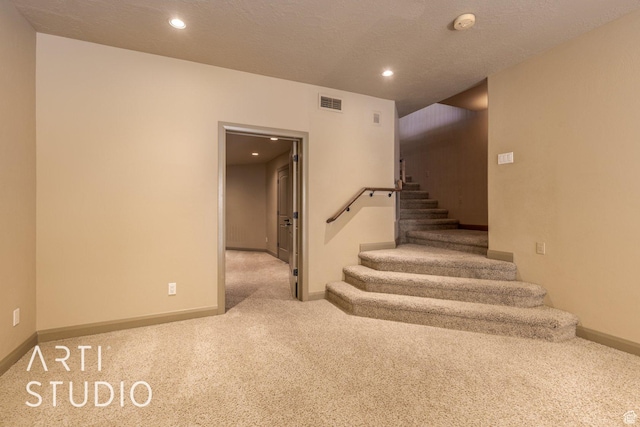 1285 Summerwood Cir, Santa Clara, UT 84765 - stairs with a textured ceiling, visible vents, recessed lighting, carpet flooring, and baseboards