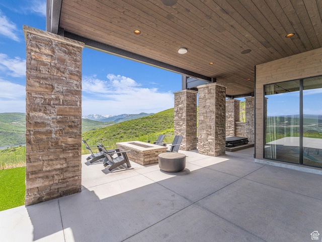 2178 E Lone Peak Ln, Kamas, UT 84036 - view of patio / terrace with a fire pit and a mountain view
