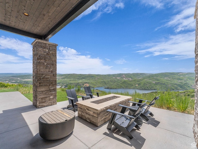 2178 E Lone Peak Ln, Kamas, UT 84036 - view of patio with a water view and an outdoor fire pit