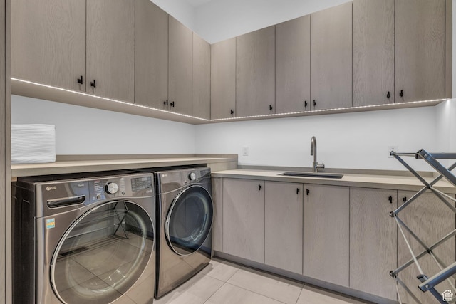 2178 E Lone Peak Ln, Kamas, UT 84036 - washroom featuring washing machine and clothes dryer, a sink, cabinet space, and light tile patterned floors