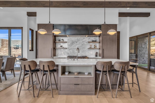 2178 E Lone Peak Ln, Kamas, UT 84036 - bar with beamed ceiling, light wood-style flooring, wet bar, and backsplash