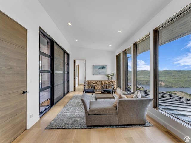 2178 E Lone Peak Ln, Kamas, UT 84036 - living area featuring light wood-type flooring, recessed lighting, and a water view