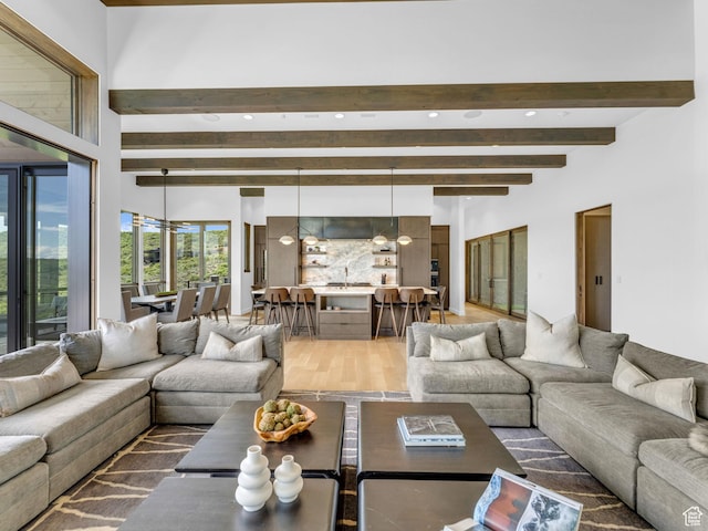 2178 E Lone Peak Ln, Kamas, UT 84036 - living room featuring light wood-style flooring, beamed ceiling, and recessed lighting