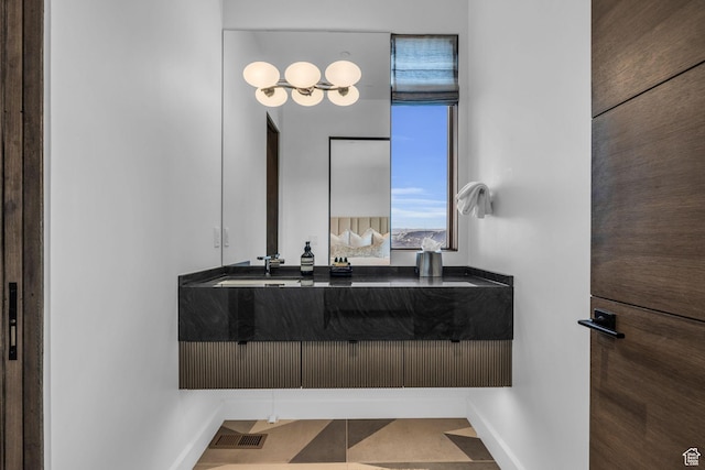 2178 E Lone Peak Ln, Kamas, UT 84036 - bathroom featuring tile patterned floors, vanity, baseboards, and visible vents