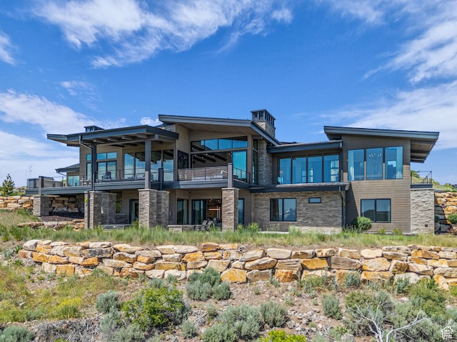2178 E Lone Peak Ln, Kamas, UT 84036 - back of property featuring stone siding and a balcony