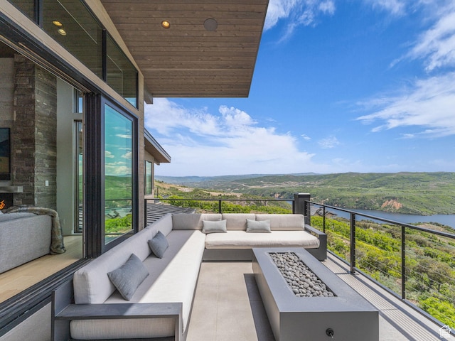2178 E Lone Peak Ln, Kamas, UT 84036 - balcony featuring an outdoor living space with a fire pit and a water and mountain view