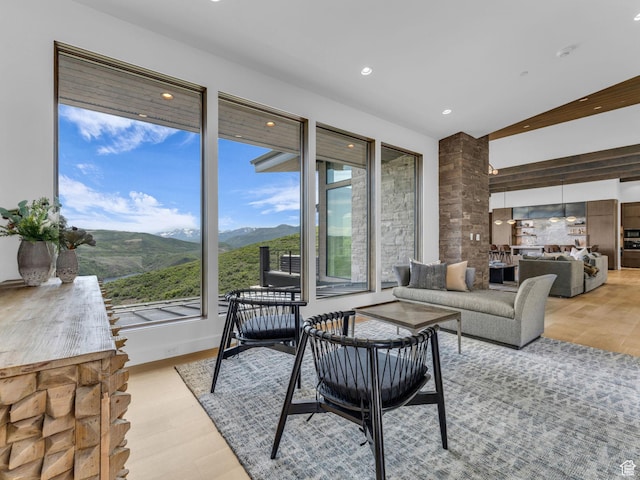 2178 E Lone Peak Ln, Kamas, UT 84036 - living room featuring wood finished floors, a mountain view, and recessed lighting