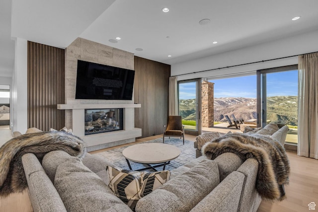 2178 E Lone Peak Ln, Kamas, UT 84036 - living area featuring recessed lighting, a fireplace, and light wood-style floors