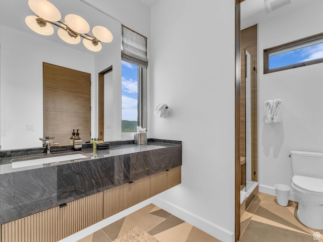 2178 E Lone Peak Ln, Kamas, UT 84036 - full bath featuring toilet, vanity, a shower stall, and baseboards