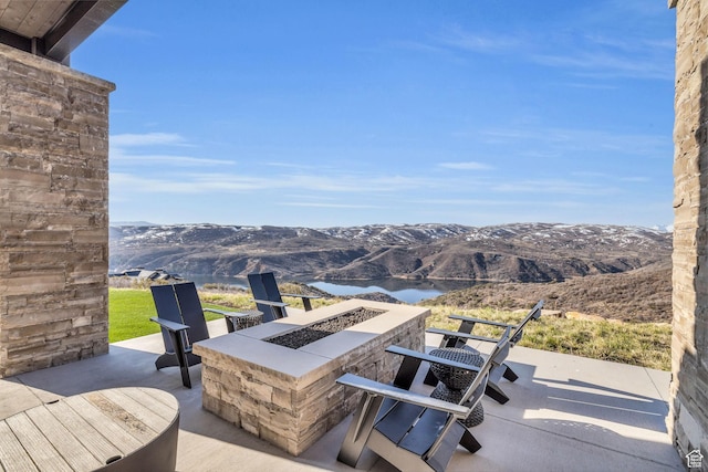 2178 E Lone Peak Ln, Kamas, UT 84036 - view of patio / terrace featuring a fire pit and a water and mountain view