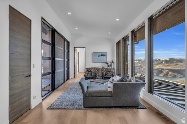 2178 E Lone Peak Ln, Kamas, UT 84036 - living room with visible vents, baseboards, a water view, recessed lighting, and light wood-style flooring