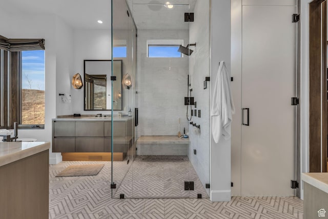 2178 E Lone Peak Ln, Kamas, UT 84036 - full bathroom featuring tile patterned floors, two vanities, and a stall shower