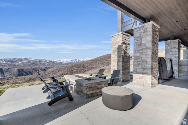 2178 E Lone Peak Ln, Kamas, UT 84036 - view of patio featuring a mountain view and an outdoor fire pit