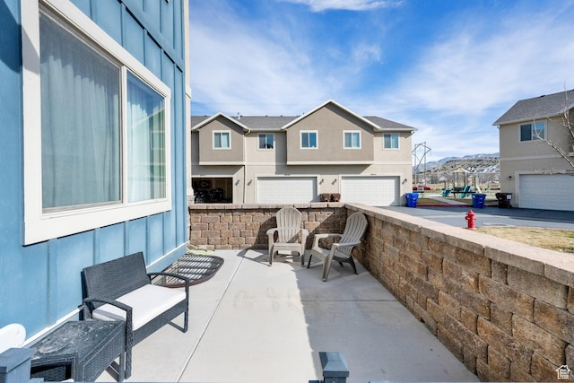3632 E Sapphire Creek Ln N Unit 318, Eagle Mountain, UT 84005 - view of patio with a mountain view