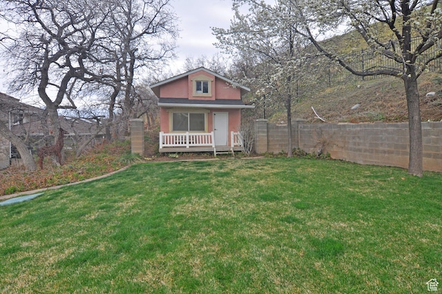360 E 1825 N, Centerville, UT 84014 - view of front of property featuring a front yard, fence, and stucco siding