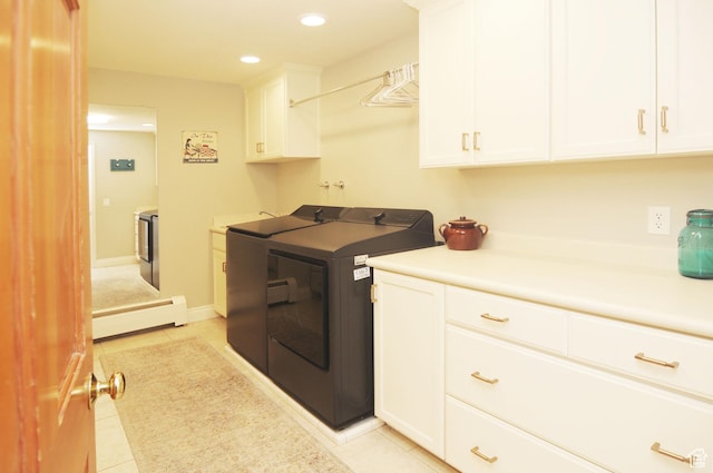 360 E 1825 N, Centerville, UT 84014 - clothes washing area featuring independent washer and dryer, a baseboard heating unit, cabinet space, and light tile patterned floors