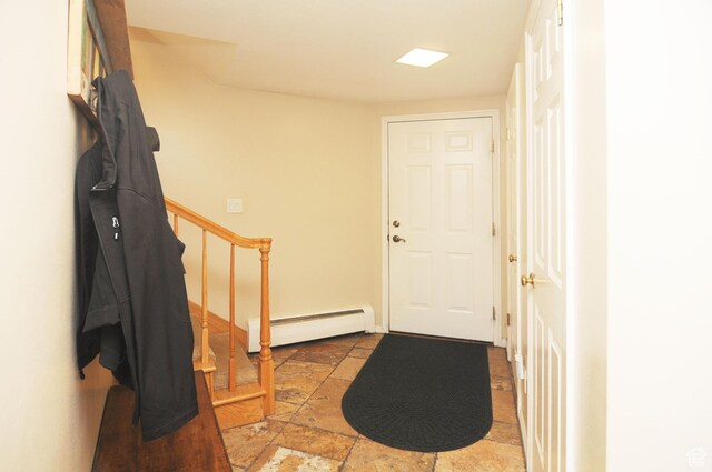 360 E 1825 N, Centerville, UT 84014 - foyer entrance featuring a baseboard heating unit, stone tile floors, and stairs