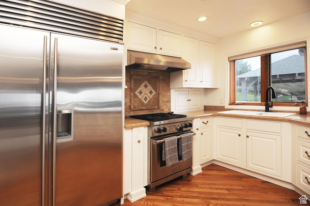 360 E 1825 N, Centerville, UT 84014 - kitchen featuring premium appliances, a sink, light countertops, under cabinet range hood, and wood finished floors