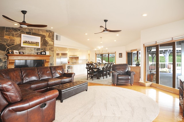 360 E 1825 N, Centerville, UT 84014 - living area with visible vents, recessed lighting, light wood finished floors, vaulted ceiling, and ceiling fan with notable chandelier