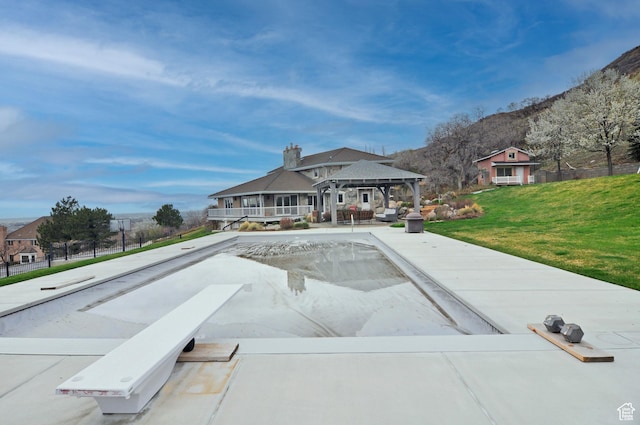 360 E 1825 N, Centerville, UT 84014 - view of swimming pool featuring a gazebo and a lawn