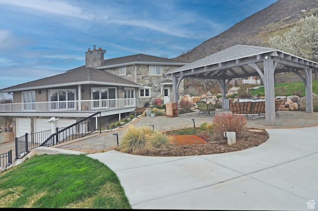 360 E 1825 N, Centerville, UT 84014 - view of community featuring an attached garage, a gazebo, a patio area, and fence