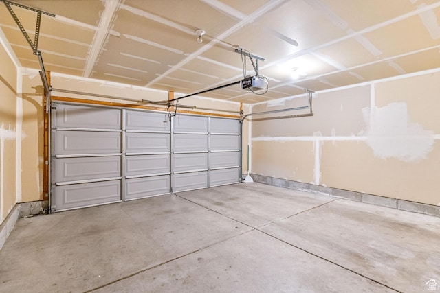 garage featuring a garage door opener