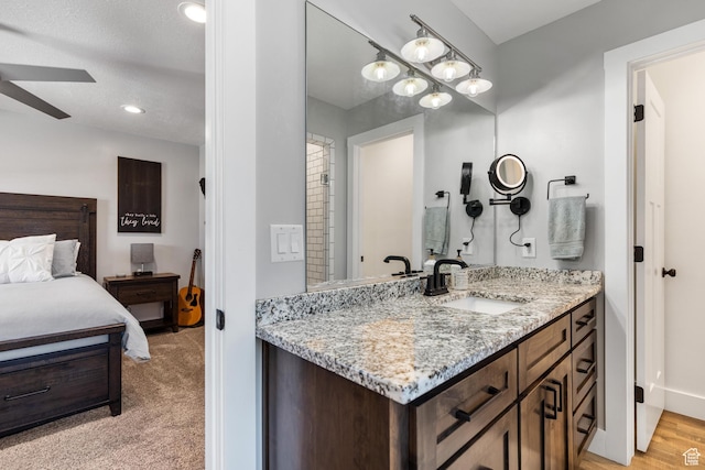 51 S 1250 E, Smithfield, UT 84335 - bathroom with ceiling fan, baseboards, vanity, and recessed lighting