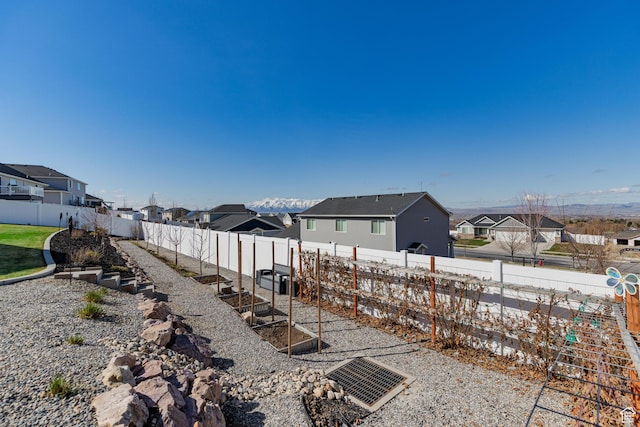 51 S 1250 E, Smithfield, UT 84335 - view of yard with a garden, a fenced backyard, and a residential view