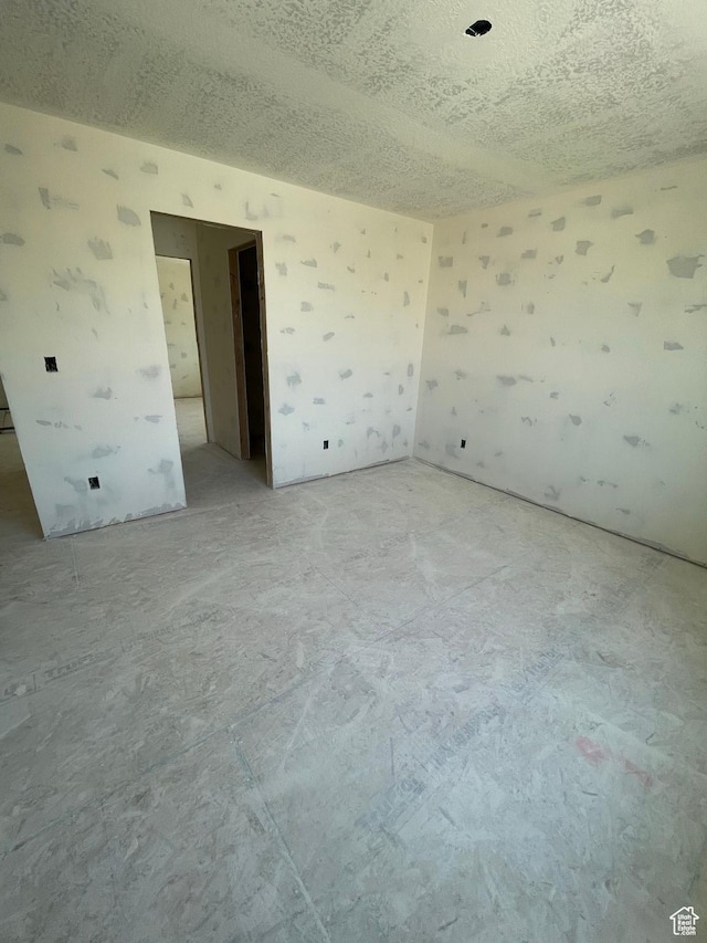 7007 W Hazel Oak Ct Unit 212, Herriman, UT 84096 - empty room featuring a textured ceiling