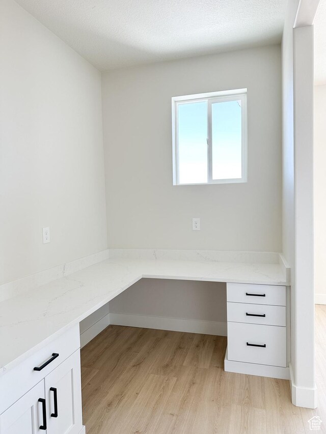 7007 W Hazel Oak Ct Unit 212, Herriman, UT 84096 - unfurnished office with built in desk and light wood-style flooring