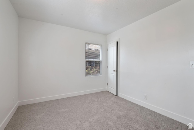 924 W California Ave, Salt Lake City, UT 84104 - carpeted empty room with baseboards