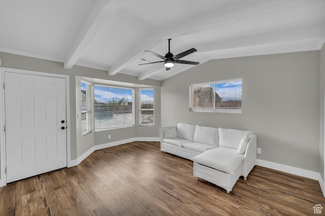 interior space with wood finished floors, ceiling fan, vaulted ceiling with beams, and a healthy amount of sunlight