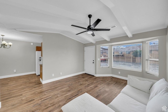 living room featuring ceiling fan with notable chandelier, visible vents, wood finished floors, vaulted ceiling with beams, and baseboards