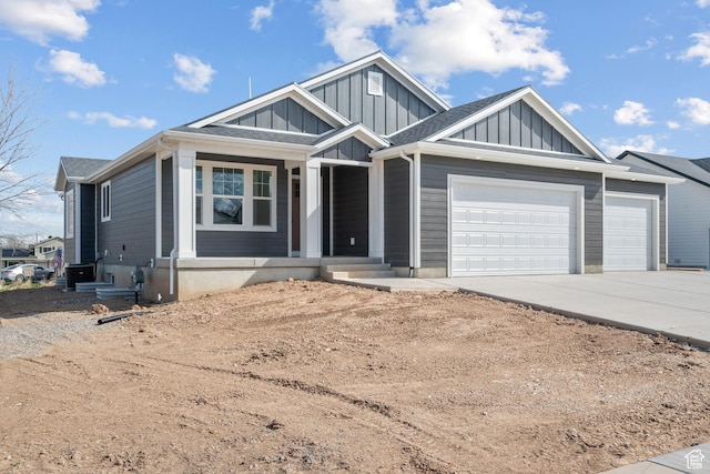 view of front of home featuring a garage, driveway, and board and batten siding