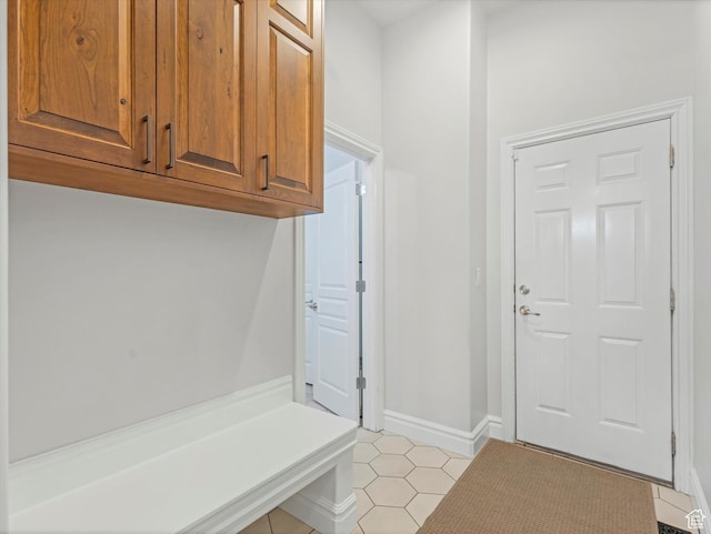 mudroom with light tile patterned floors